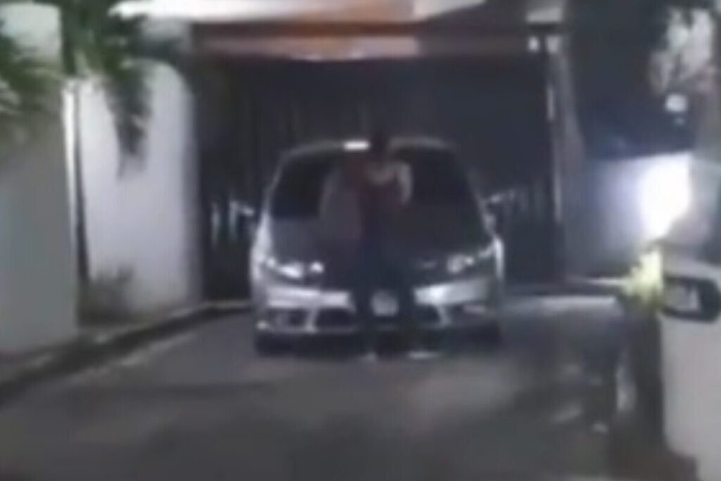   “Flagrou o marido saindo do motel, no Dia dos Namorados. O bicho tá pegando”, comenta a moradora que registrou a cena. (Foto: Captura)