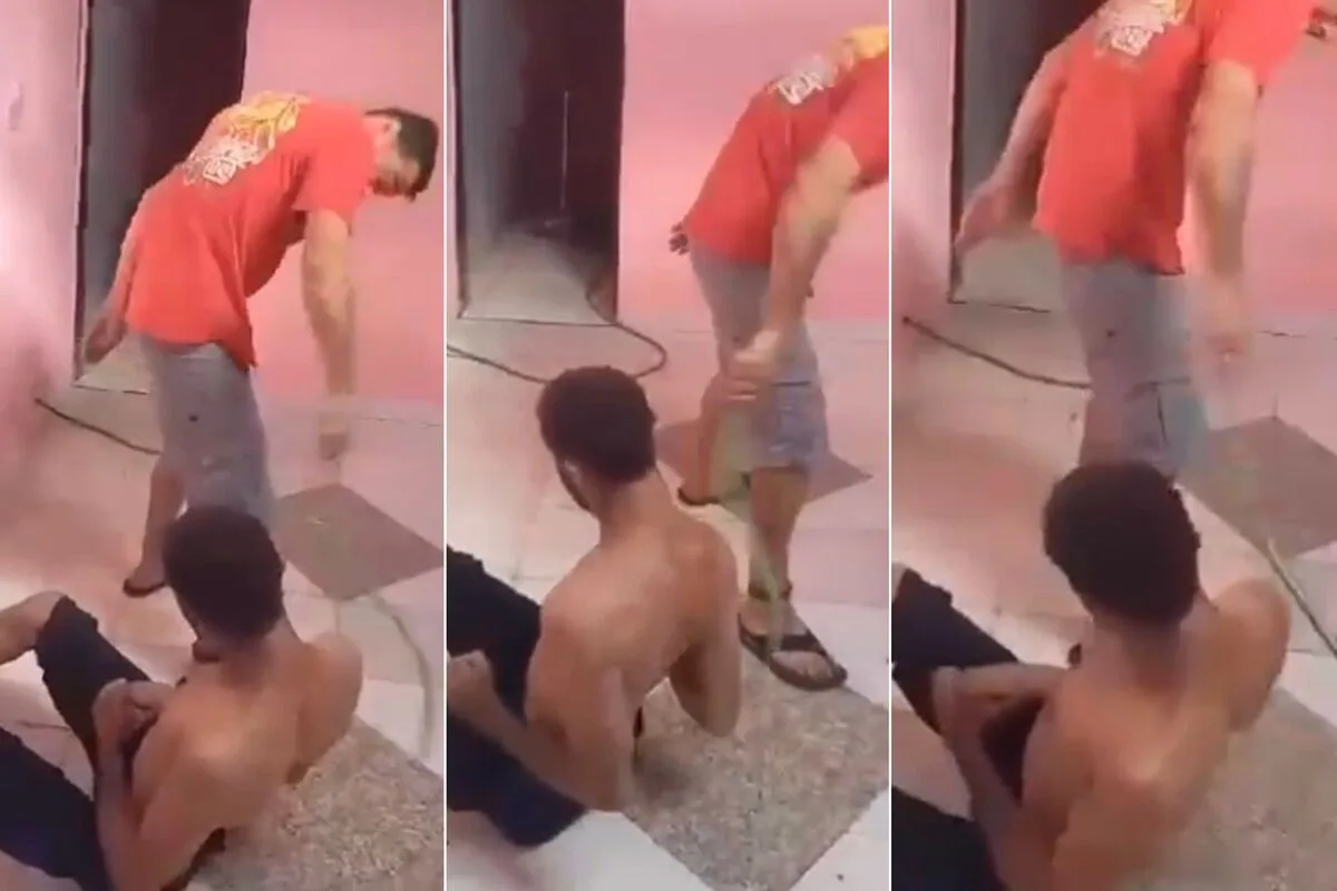 Imagens registradas em celular mostram a homem sendo torturado com golpes de mangueira (Foto: Captura)
